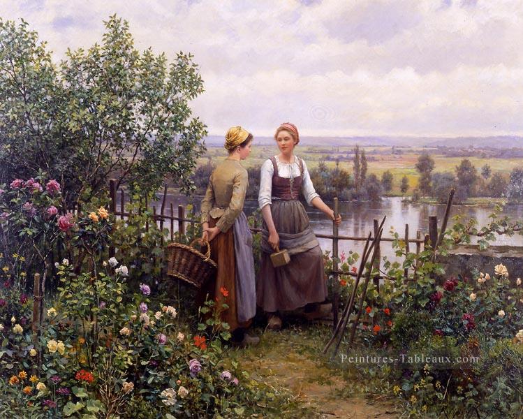 Maria et Madeleine sur la terrasse countrywoman Daniel Ridgway Knight Flowers Peintures à l'huile